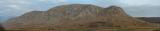 I took a panoramic picture of a mountain, that has a cat face right in the center