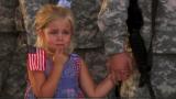 Her dad was leaving on a 2 year deployment. She was crying, and wouldn’t let go of her dad’s hand, even when he stood in line.