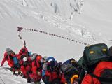 Mt. Everest, May 2013. 60 years ago no one had reached the top, now traffic jams cause hours of delays and the deaths of many climbers.
