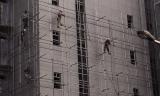 South Korean scaffolding workers, about 60-80 feet up.