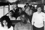 A man rides a bus in Durban, meant for white passengers only, in resistance to South Africa’s apartheid policies (1986)