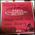 My husband asked the delivery guy to write his best pizza joke on the box.