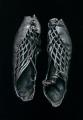 A pair of intricately cut shoes that were found on a bog body from over 2,300 years ago