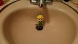 So many people were showing their Elf on a Shelf, so I did one better. A Link in a Sink.