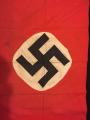 During WWII my uncle and his group over took a nazi tank. He kept the flag they all signed