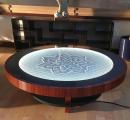 Kinetic tables use a ball bearing to create endless hypnotic designs