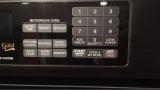 this microwave has a button that says 