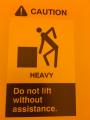 The stick figure on this caution sign looks like it's doing the single ladies dance.