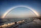 Very rare white rainbow seen near Sout Uist, Scotland. In ancient China these were considered as harbingers of bad luck.