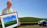 Charles O'Rear with the world's most viewed photo, 'Bliss', taken in Sonoma County, CA (1996)