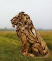 PsBattle: A wooden statue of a lion.