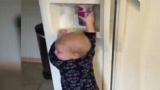 Drunk baby fails at getting basic cup of water