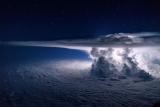 Developing thunderstorm over the Pacific Ocean at 37,000 feet