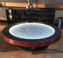 Coffee table that creates kinetic sand sculptures