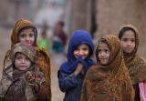 Afghan refugees in a slum on the outskirts of Islamabad, photo by Muhammed Muheisen, Pakistan, January 20, 2011