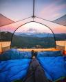 This transparent tent with a sunset view of Mount Rainier