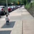 These two toddlers' reaction to spotting each other on the street.