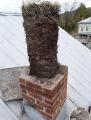 Tearing down an unused chimney only to find 25 generations of stacked up birds nests