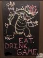 I draw Smash Bros characters in chalk at our local gaming bar. Here’s Bowser!