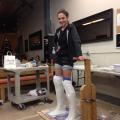 Gal Gadot standing in molds for her Wonder Woman boots.