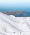 In Lebanon where you can see the Mediterranean sea from snowy mountains :-)