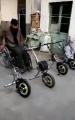 Motorized wheelchair attachment