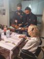 Italian cops helping out a hungry and lonely 87 years old woman after she called the emergency number.