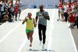 Usain Bolt runs as a guide for blind Paralympic champion Terezinha Guilhermina in Rio (2015)