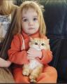 A little girl and her kitten