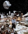 George Lucas surrounded by Star Wars props 1977