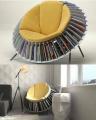 A reading chair with built-in shelves all around it