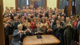 Evil Texas legislators smiling as they sign law to take away rights