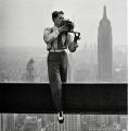 Remember that photo of the construction workers having lunch on the unfinished Empire State Building? Well here's the photographer Charles Ebbets taking that photo. 9/20/1932 [1024 - 1024]