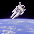 NASA Photo of Astronaut Bruce McCandless II using a nitrogen-propelled hand-controlled Manned Maneuvering Unit (MMU) in Feb 1984.