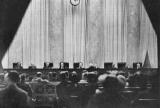 Only one of two photographs in existence of the US Supreme Court in session. Cameras are forbidden in the Supreme Court, but this photograph was taken by a young woman who concealed her small camera in her handbag, cutting a hole through which the lens peeped, 1937. [568x384] (x-post)