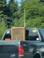 The beehive in the back of this truck. Judging by the sticker on the window it’s a local beekeeper.